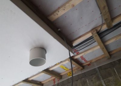 Vent axia Kildare Heat recovery Ventilation Duct taped coming through airtightness membrane & Cosi board