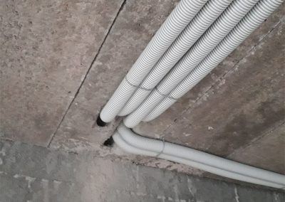 Vent axia Longford Heat recovery Ventilation Ducts fixed to concrete slab