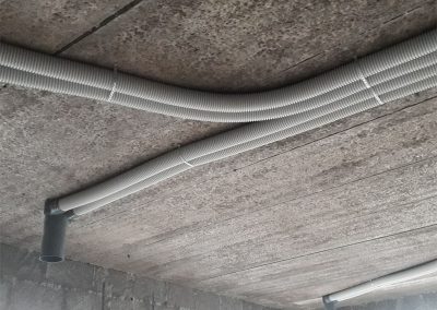 Vent axia Dublin Heat recovery Ventilation Ducts fixed to concrete slab