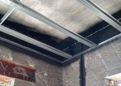 Air Tightness Testing & Thermal Imaging Kildare SOLUTION - Before installing metal ceiling use of air tight paint to seal Electrical chases & porous concrete blocks