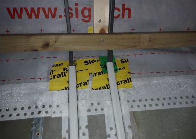 Air Tightness Testing & Thermal Imaging Westmeath SOLUTION - Airtight membrane tapes around electrical services
